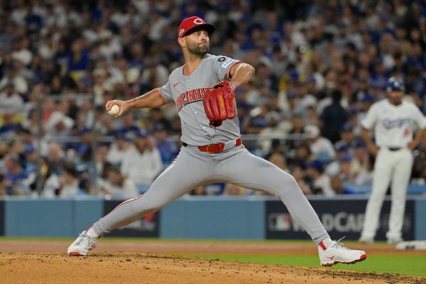 Oct 1, 2025; Los Angeles, California, USA; Cincinnati Reds pitcher Nick Martinez (28) throws a pitch against the Los Angeles Dodgers in the sixth inning during game two of the Wildcard round for the 2025 MLB playoffs at Dodger Stadium. Mandatory Credit: Jayne Kamin-Oncea-Imagn Images