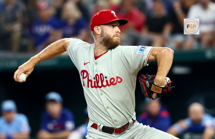 Aug 10, 2025; Arlington, Texas, USA;  Philadelphia Phillies starting pitcher Zack Wheeler (45) throws during the first inning against the Texas Rangers at Globe Life Field. Credit: Kevin Jairaj-Imagn Images
