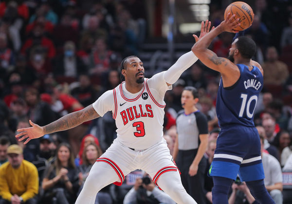 CHICAGO, IL - FEBRUARY 06: Andre Drummond #3 of the Chicago Bulls guards Mike Conley #10 of the Minnesota Timberwolves during the first half at the United Center on February 6, 2024 in Chicago, Illinois. (Photo by Melissa Tamez/Icon Sportswire)