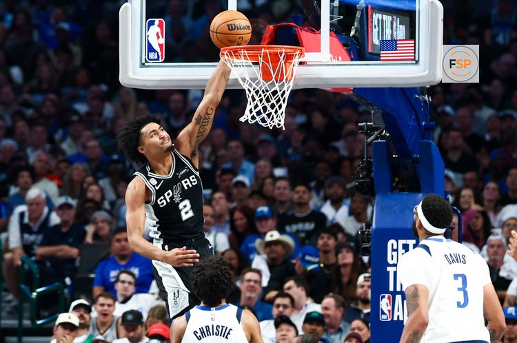 Oct 22, 2025; Dallas, Texas, USA;   San Antonio Spurs guard Dylan Harper (2) scores during the first half against the Dallas Mavericks at American Airlines Center. Credit: Kevin Jairaj-Imagn Images