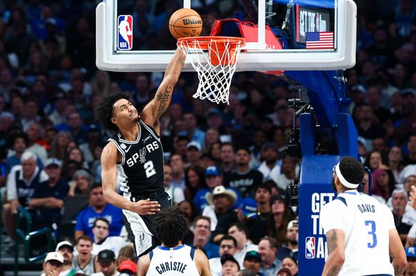 Oct 22, 2025; Dallas, Texas, USA;   San Antonio Spurs guard Dylan Harper (2) scores during the first half against the Dallas Mavericks at American Airlines Center. Mandatory Credit: Kevin Jairaj-Imagn Images