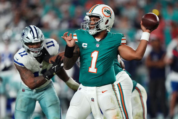 Dec 24, 2023; Miami Gardens, Florida, USA; Miami Dolphins quarterback Tua Tagovailoa (1) attempts a pass against the Dallas Cowboys during the second half at Hard Rock Stadium. Mandatory Credit: Jasen Vinlove-USA TODAY Sports