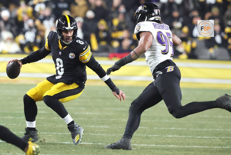 Jan 4, 2026; Pittsburgh, Pennsylvania, USA; Pittsburgh Steelers quarterback Aaron Rodgers (8) avoids the sack by Baltimore Ravens linebacker Tavius Robinson (95) during the first half at Acrisure Stadium. Credit: Charles LeClaire-Imagn Images