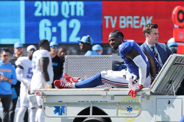 Sep 28, 2025; East Rutherford, New Jersey, USA; New York Giants wide receiver Malik Nabers (1) is carted off the field following an injury during the second quarter against the Los Angeles Chargers at MetLife Stadium. Mandatory Credit: Brad Penner-Imagn Images
