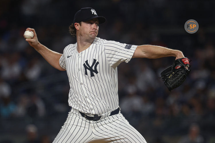 Sep 26, 2024; Bronx, New York, USA; New York Yankees starting pitcher Gerrit Cole (45) delivers a pitch during the first inning against the Baltimore Orioles at Yankee Stadium. Credit: Vincent Carchietta-Imagn Images