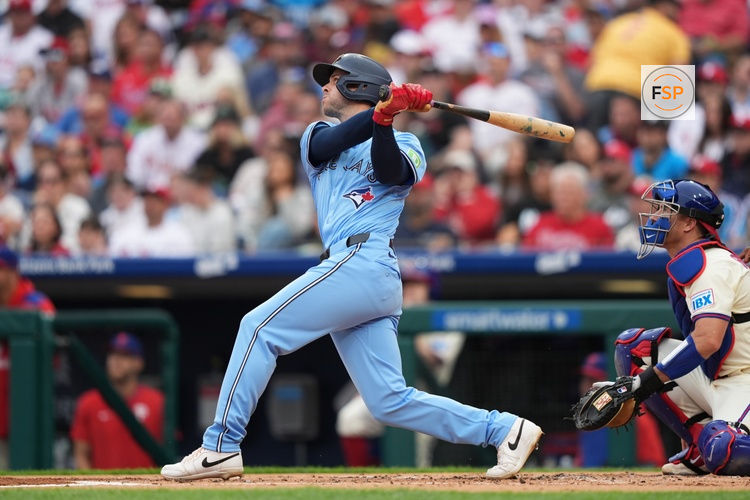 Jun 14, 2025; Philadelphia, Pennsylvania, USA; Toronto Blue Jays infielder Ernie Clement (22) hits a double against the Philadelphia Phillies in the second inning at Citizens Bank Park. Credit: Kyle Ross-Imagn Images