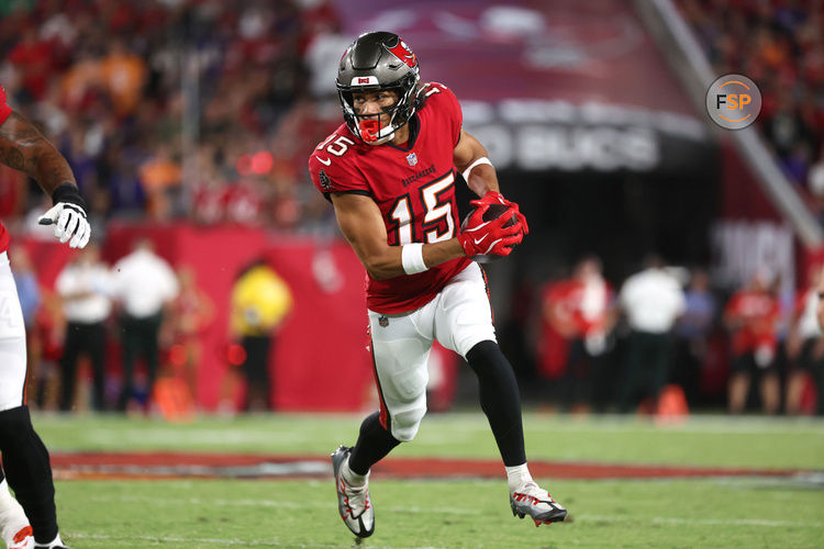 Oct 21, 2024; Tampa, Florida, USA; Tampa Bay Buccaneers wide receiver Jalen McMillan (15) runs with the ball against the Baltimore Ravens during the first quarter at Raymond James Stadium. Credit: Kim Klement Neitzel-Imagn Images