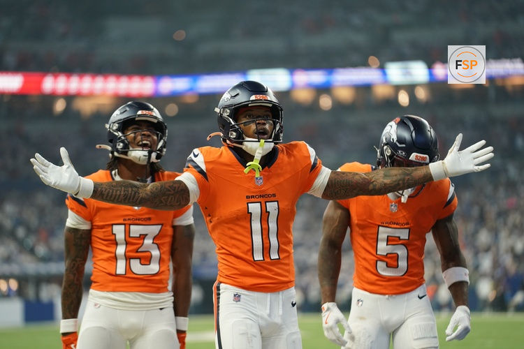 Sep 14, 2025; Indianapolis, Indiana, USA; Denver Broncos wide receiver Troy Franklin (11) celebrates scoring a touchdown during the second quarter against the Indianapolis Colts at Lucas Oil Stadium. Credit: Robert Goddin-Imagn Images