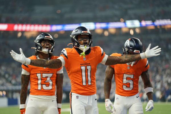 Sep 14, 2025; Indianapolis, Indiana, USA; Denver Broncos wide receiver Troy Franklin (11) celebrates scoring a touchdown during the second quarter against the Indianapolis Colts at Lucas Oil Stadium. Mandatory Credit: Robert Goddin-Imagn Images