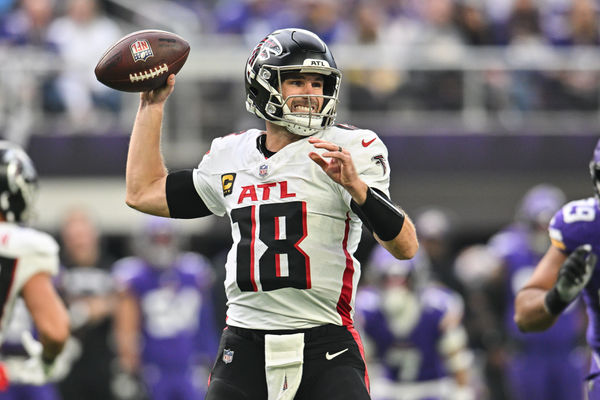 Dec 8, 2024; Minneapolis, Minnesota, USA; Atlanta Falcons quarterback Kirk Cousins (18) throws a pass against the Minnesota Vikings during the second quarter at U.S. Bank Stadium. Mandatory Credit: Jeffrey Becker-Imagn Images