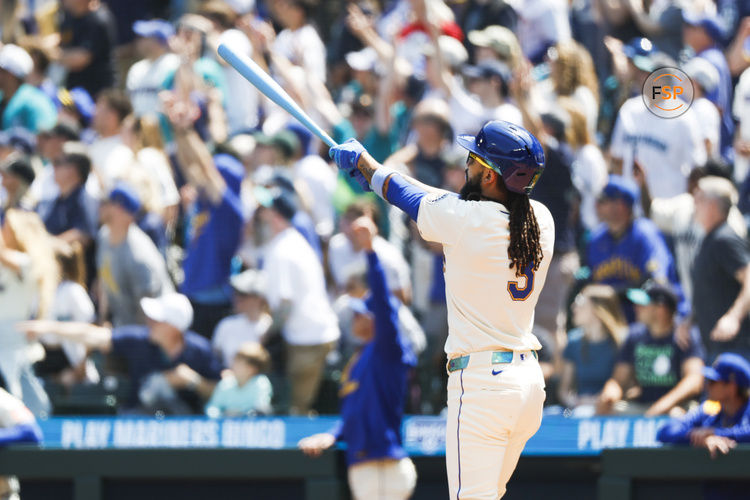 Jun 15, 2025; Seattle, Washington, USA; Seattle Mariners shortstop J.P. Crawford (3) hits a grand-slam home run Cleveland Guardians during the second inning at T-Mobile Park. Credit: Joe Nicholson-Imagn Images