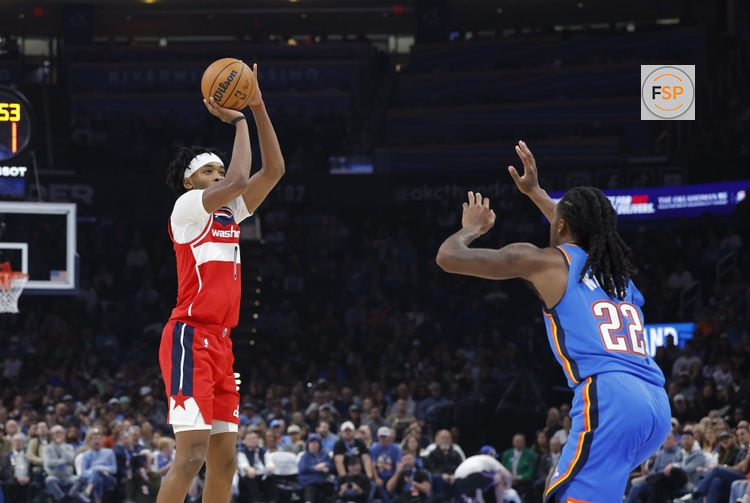 Oct 30, 2025; Oklahoma City, Oklahoma, USA; Washington Wizards guard Bilal Coulibaly (0) shoots over Oklahoma City Thunder guard Cason Wallace (22) during the second quarter at Paycom Center. Credit: Alonzo Adams-Imagn Images