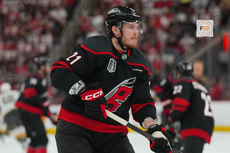 Jun 4, 2026; Raleigh, North Carolina, USA; Carolina Hurricanes defenseman Alexander Nikishin (21) skates  against the Vegas Golden Knights during the warmups in game two of the 2026 Stanley Cup Final at Lenovo Center. Credit: James Guillory-Imagn Images