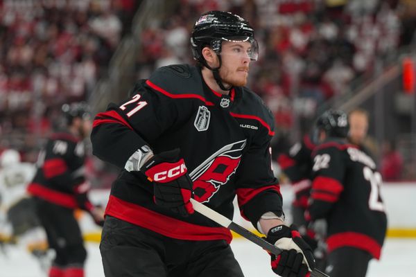 Jun 4, 2026; Raleigh, North Carolina, USA; Carolina Hurricanes defenseman Alexander Nikishin (21) skates  against the Vegas Golden Knights during the warmups in game two of the 2026 Stanley Cup Final at Lenovo Center. Mandatory Credit: James Guillory-Imagn Images