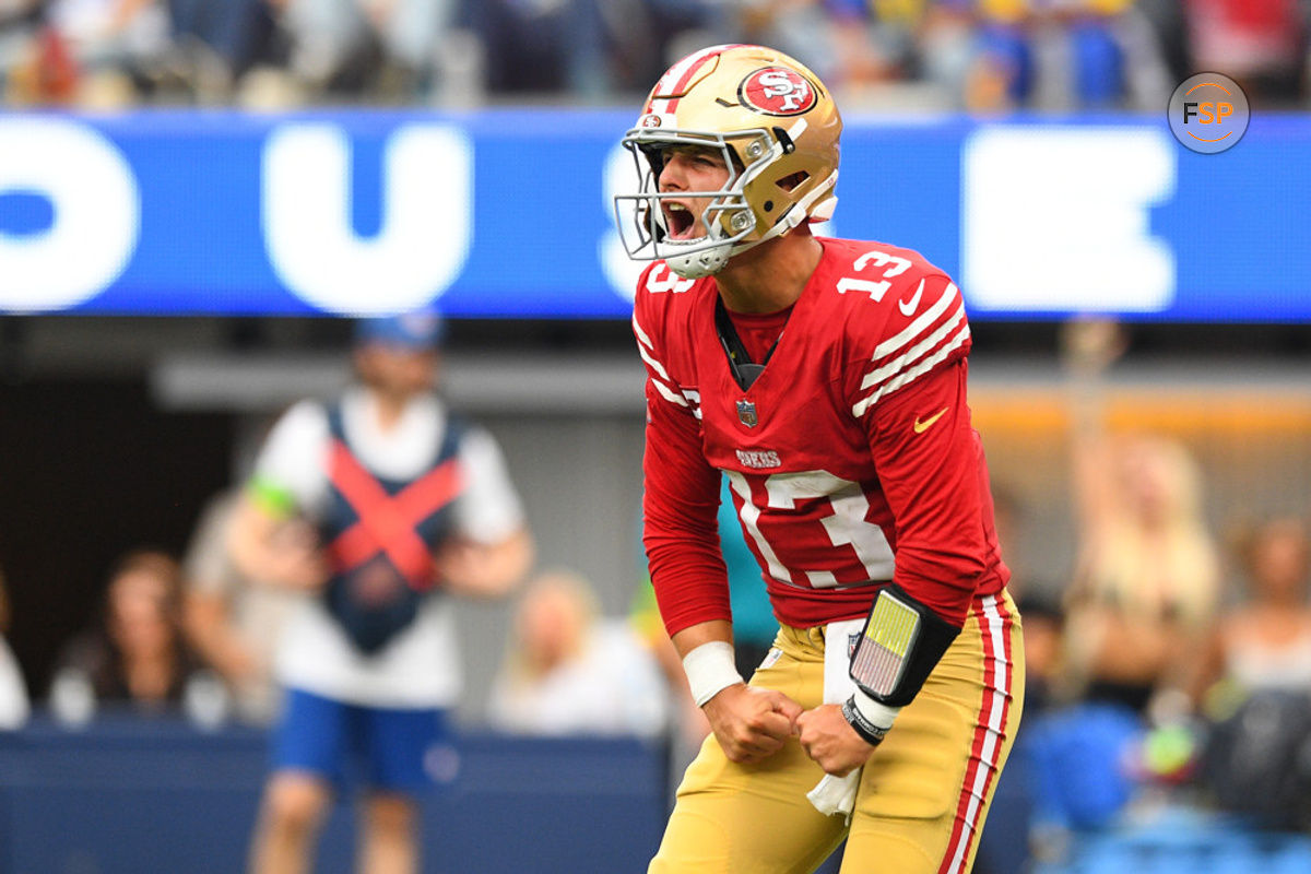 INGLEWOOD, CA - SEPTEMBER 17: San Francisco 49ers quarterback Brock Purdy (13) celebrates after a touchdown pass during the NFL game between the San Francisco 49ers and the Los Angeles Rams on September 17, 2023, at SoFi Stadium in Inglewood, CA. (Photo by Brian Rothmuller/Icon Sportswire)