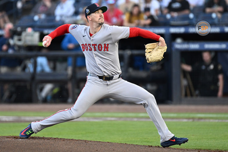 Apr 15, 2025; St. Petersburg, Florida, USA; Boston Red Sox starting pitcher Walker Buehler throws a pitch in the first inning against the Tampa Bay Rays. All players wore number 42 for Jackie Robinson Day at George M. Steinbrenner Field. Credit: Jonathan Dyer-Imagn Images