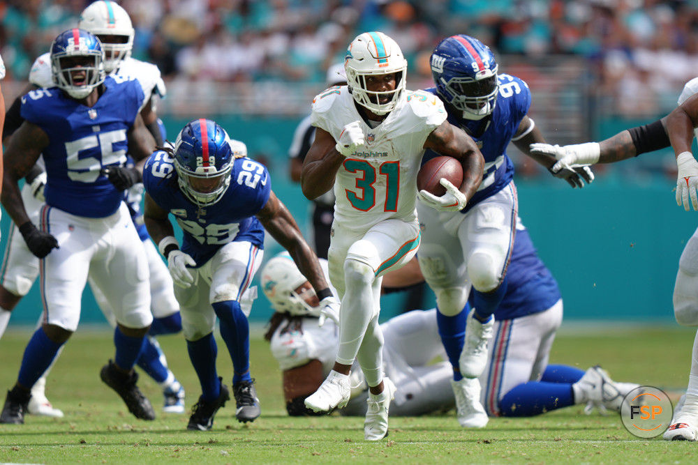 MIAMI GARDENS, FL - OCTOBER 08: Miami Dolphins running back Raheem Mostert (31) break free for a long run during the game between the New York Giants and the Miami Dolphins on Sunday, October 8, 2023 at Hard Rock Stadium, Miami Gardens, Fla. (Photo by Peter Joneleit/Icon Sportswire)