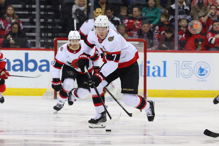 Jan 19, 2025; Newark, New Jersey, USA; Ottawa Senators left wing Brady Tkachuk (7) skates with the puck against the New Jersey Devils during the third period at Prudential Center. Credit: Ed Mulholland-Imagn Images