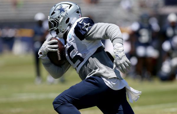 Jul 30, 2024; Oxnard, CA, USA; Dallas Cowboys running back Ezekiel Elliott (15) runs during training camp at the River Ridge Playing Fields in Oxnard, California. Mandatory Credit: Jason Parkhurst-USA TODAY Sports