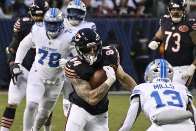 Jan 4, 2026; Chicago, Illinois, USA; Chicago Bears tight end Colston Loveland (84) runs with the ball against Detroit Lions safety Jalen Mills (13) during the first half at Soldier Field. Mandatory Credit: Matt Marton-Imagn Images