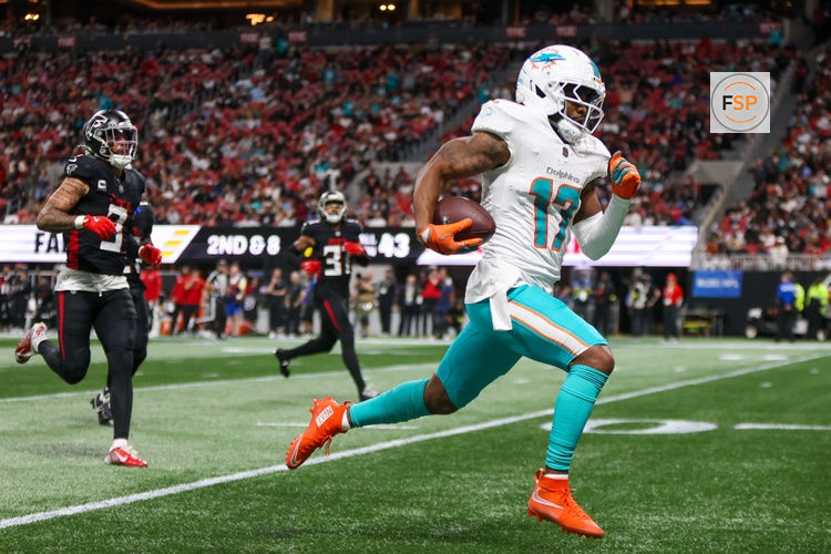Oct 26, 2025; Atlanta, Georgia, USA; Miami Dolphins wide receiver Jaylen Waddle (17) scores a touchdown against the Atlanta Falcons in the third quarter at Mercedes-Benz Stadium. Credit: Brett Davis-Imagn Images