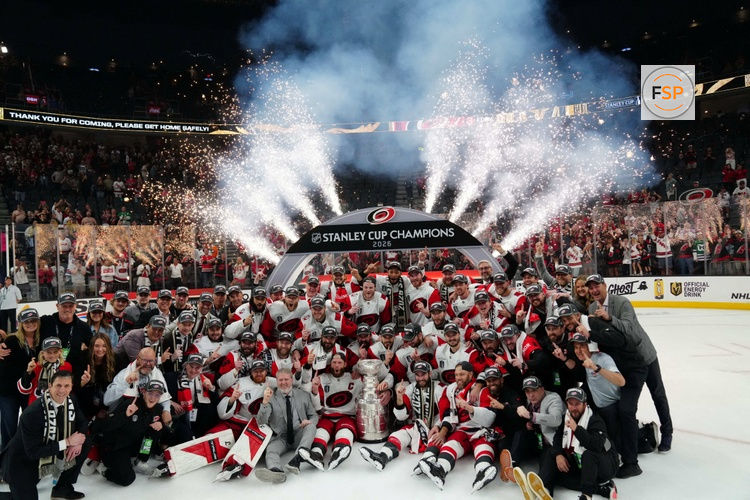 Jun 14, 2026; Las Vegas, Nevada, USA; The Carolina Hurricanes pose with the the Stanley Cup after defeating Vegas Golden Knights in game six of the 2026 Stanley Cup Final at T-Mobile Arena. Credit: Stephen R. Sylvanie-Imagn Images     TPX IMAGES OF THE DAY     