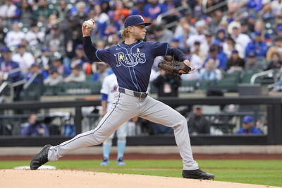 Jun 15, 2025; New York City, New York, USA;  Tampa Bay Rays pitcher Shane Baz (11) delivers a pitch against the New York Mets during the first inning at Citi Field. Mandatory Credit: Gregory Fisher-Imagn Images