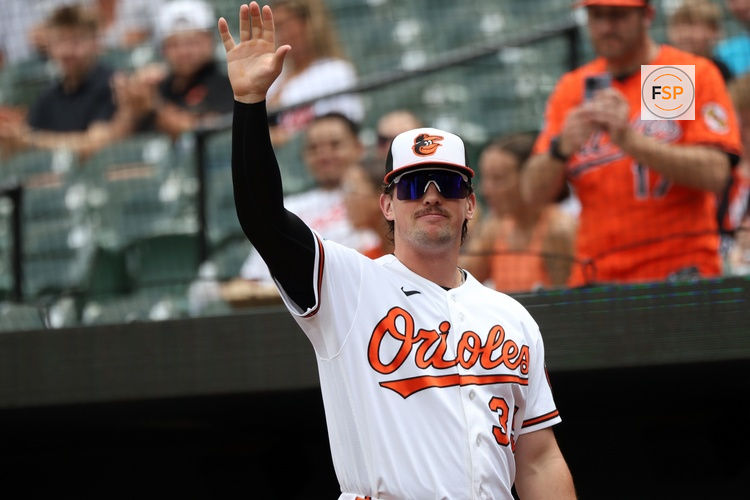 Jul 12, 2026; Baltimore, Maryland, USA; Baltimore Orioles catcher Adley Rutschman (35) waives to the fans before a game against the Kansas City Royals at Oriole Park at Camden Yards. Credit: Daniel Kucin Jr.-Imagn Images