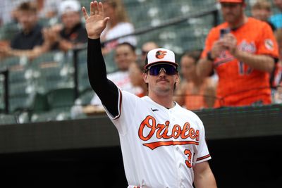 Jul 12, 2026; Baltimore, Maryland, USA; Baltimore Orioles catcher Adley Rutschman (35) waives to the fans before a game against the Kansas City Royals at Oriole Park at Camden Yards. Mandatory Credit: Daniel Kucin Jr.-Imagn Images