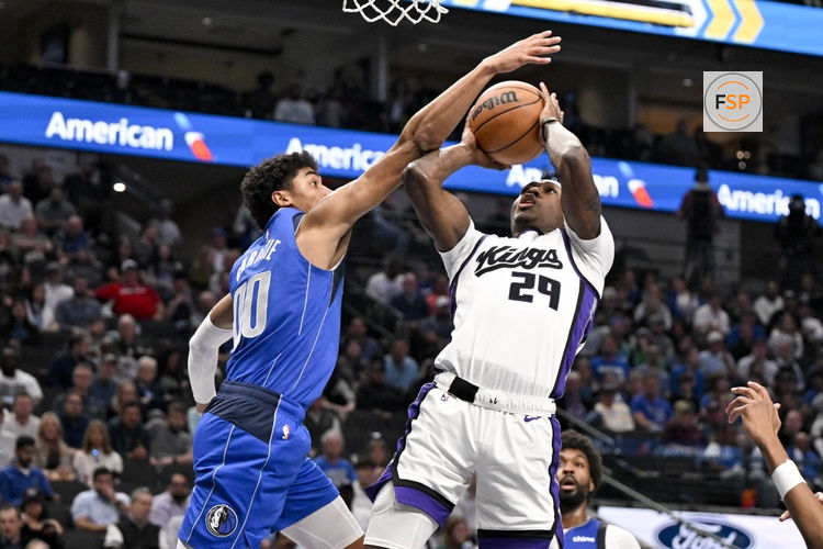 Feb 26, 2026; Dallas, Texas, USA; Sacramento Kings guard Daeqwon Plowden (29) is fouled by Dallas Mavericks guard Max Christie (00) during the second half at the American Airlines Center. Credit: Jerome Miron-Imagn Images
