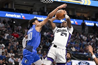 Feb 26, 2026; Dallas, Texas, USA; Sacramento Kings guard Daeqwon Plowden (29) is fouled by Dallas Mavericks guard Max Christie (00) during the second half at the American Airlines Center. Mandatory Credit: Jerome Miron-Imagn Images