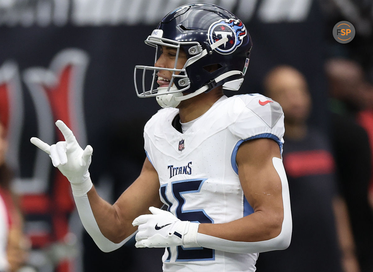 Nov 24, 2024; Houston, Texas, USA;  Tennessee Titans wide receiver Nick Westbrook-Ikhine (15) celebrates his touchdown reception against the Houston Texans in the first quarter at NRG Stadium. Credit: Thomas Shea-Imagn Images