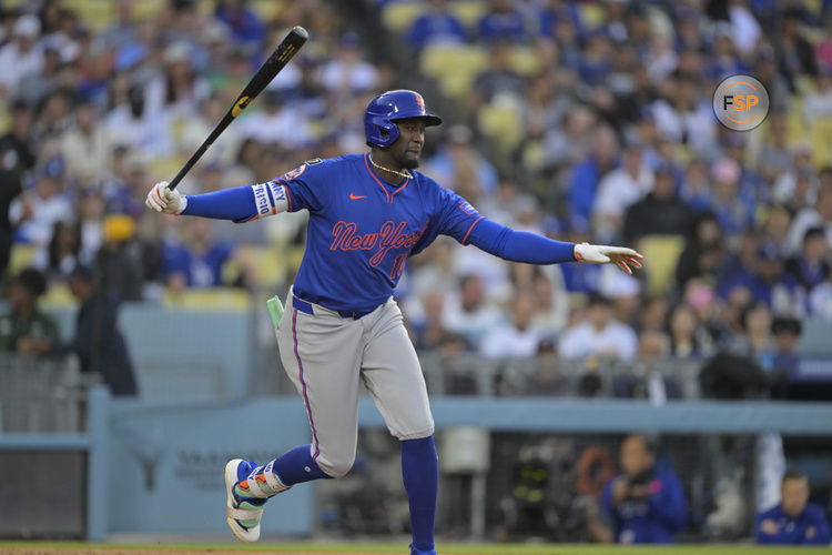 Jun 4, 2025; Los Angeles, California, USA; New York Mets third baseman Ronny Mauricio (10) reacts to a strikeout during the first inning against the Los Angeles Dodgers at Dodger Stadium. Credit: Jayne Kamin-Oncea-Imagn Images