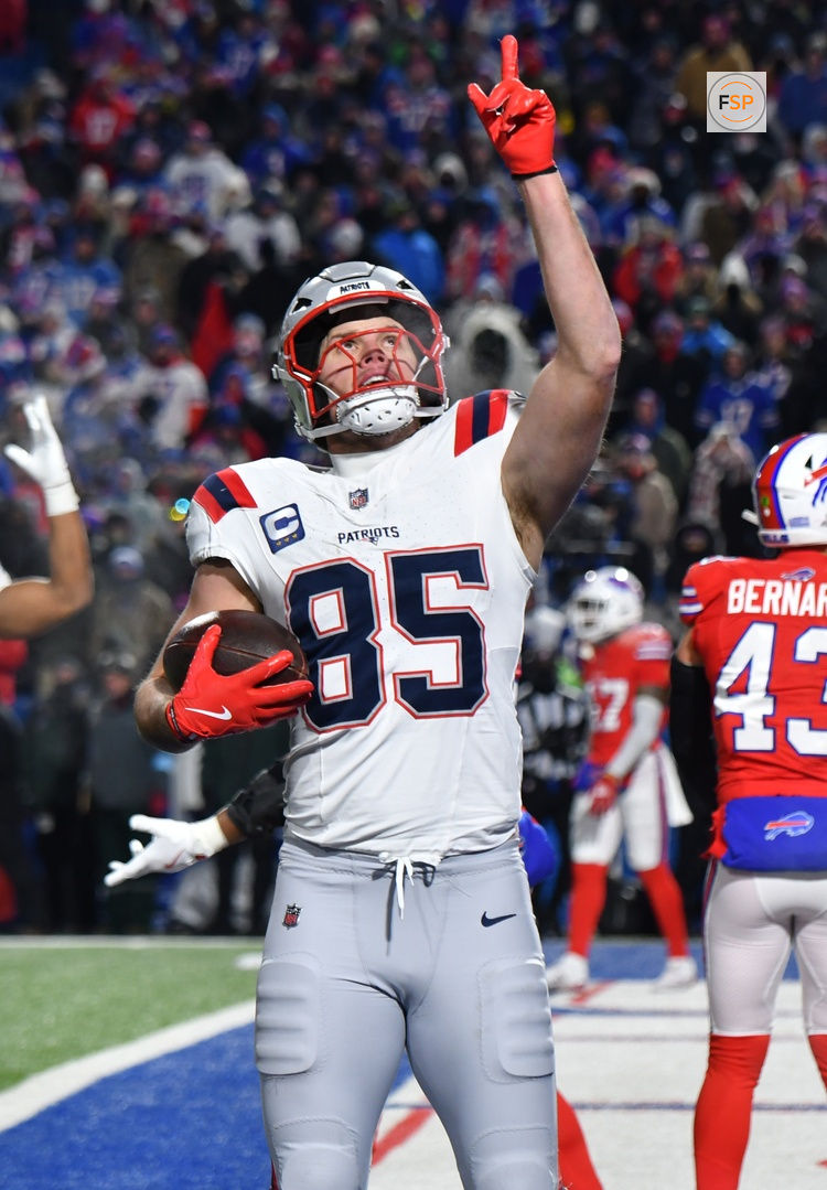 Dec 22, 2024; Orchard Park, New York, USA; New England Patriots tight end Hunter Henry (85) reacts to scoring a touchdown against the Buffalo Bills in the fourth quarter at Highmark Stadium. Credit: Mark Konezny-Imagn Images