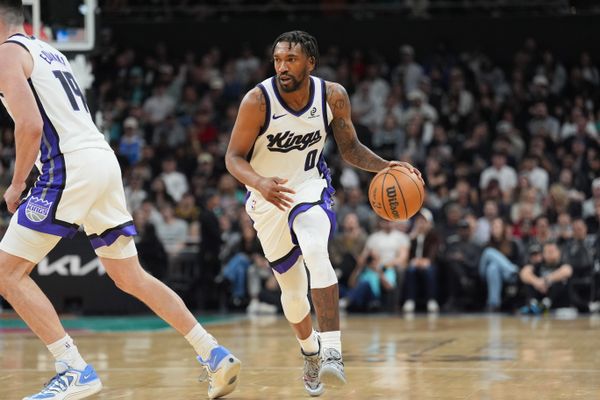 Feb 21, 2026; Austin, Texas, USA;  Sacramento Kings guard Malik Monk (0) dribbles in the second half against the San Antonio Spurs at Moody Center. Mandatory Credit: Daniel Dunn-Imagn Images