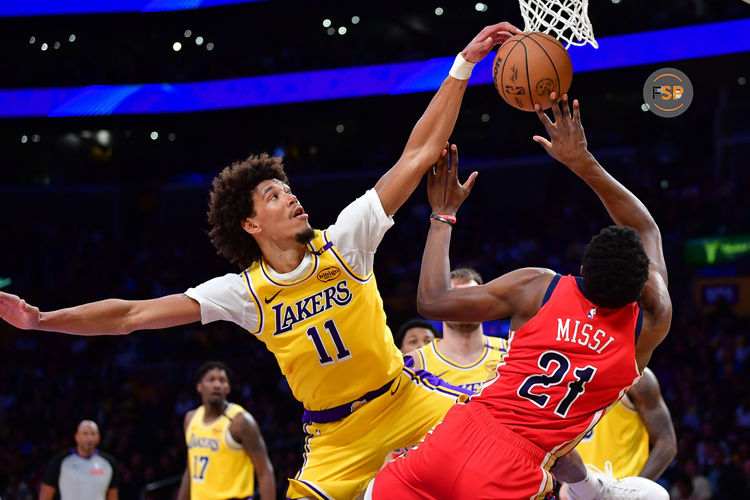 Mar 4, 2025; Los Angeles, California, USA; Los Angeles Lakers center Jaxson Hayes (11) blcoks the shot of New Orleans Pelicans center Yves Missi (21) during the second half at Crypto.com Arena. Credit: Gary A. Vasquez-Imagn Images