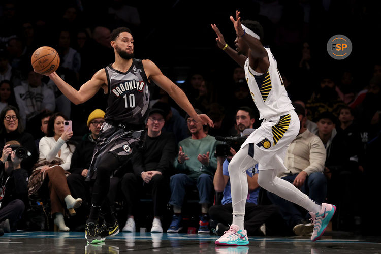 Dec 4, 2024; Brooklyn, New York, USA; Brooklyn Nets guard Ben Simmons (10) looks to pass the ball against Indiana Pacers forward Pascal Siakam (43) during the second quarter at Barclays Center. Credit: Brad Penner-Imagn Images