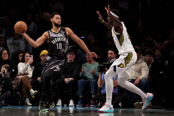 Dec 4, 2024; Brooklyn, New York, USA; Brooklyn Nets guard Ben Simmons (10) looks to pass the ball against Indiana Pacers forward Pascal Siakam (43) during the second quarter at Barclays Center. Mandatory Credit: Brad Penner-Imagn Images