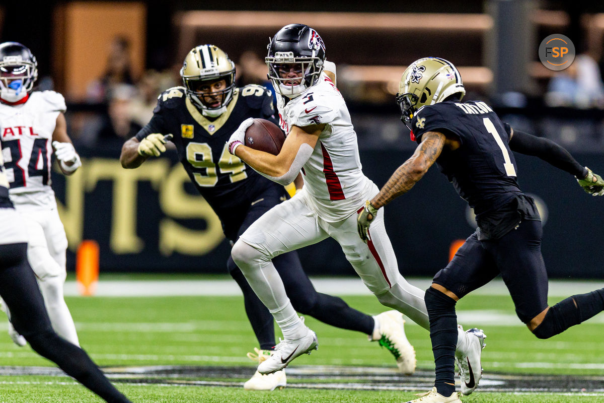 Nov 10, 2024; New Orleans, Louisiana, USA;  New Orleans Saints cornerback Alontae Taylor (1) tackles Atlanta Falcons wide receiver Drake London (5) after a play during the second half at Caesars Superdome. Credit: Stephen Lew-Imagn Images