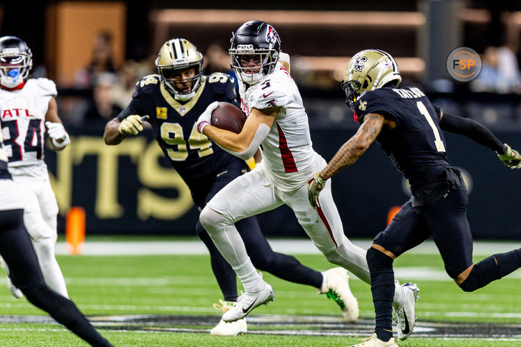 Nov 10, 2024; New Orleans, Louisiana, USA;  New Orleans Saints cornerback Alontae Taylor (1) tackles Atlanta Falcons wide receiver Drake London (5) after a play during the second half at Caesars Superdome. Credit: Stephen Lew-Imagn Images