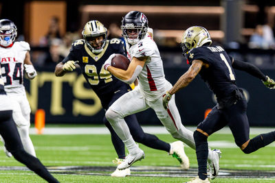 Nov 10, 2024; New Orleans, Louisiana, USA;  New Orleans Saints cornerback Alontae Taylor (1) tackles Atlanta Falcons wide receiver Drake London (5) after a play during the second half at Caesars Superdome. Mandatory Credit: Stephen Lew-Imagn Images