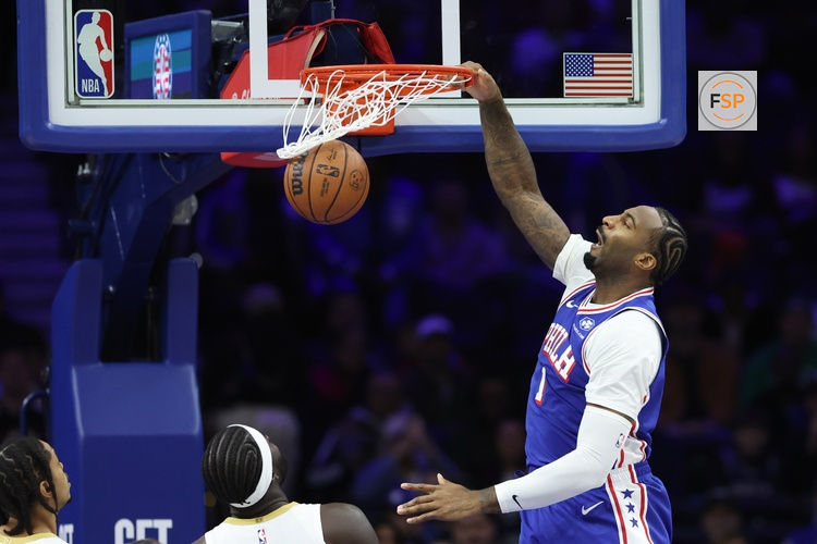 Nov 11, 2025; Philadelphia, Pennsylvania, USA; Philadelphia 76ers center Andre Drummond (1) dunks the ball against the Boston Celtics during the first quarter at Xfinity Mobile Arena. Credit: Bill Streicher-Imagn Images