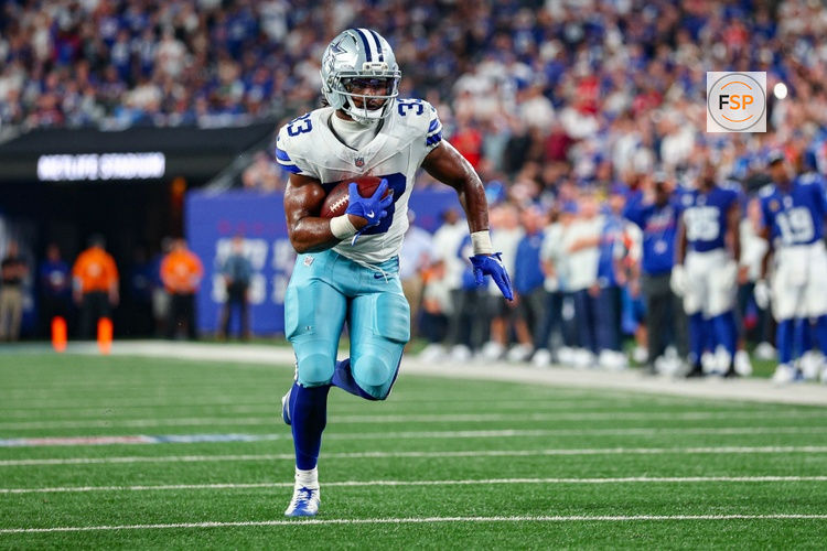 Sep 13, 2026; East Rutherford, New Jersey, USA; Dallas Cowboys running back Javonte Williams (33) carries the ball against the New York Giants at MetLife Stadium. Credit: Vincent Carchietta-Imagn Images