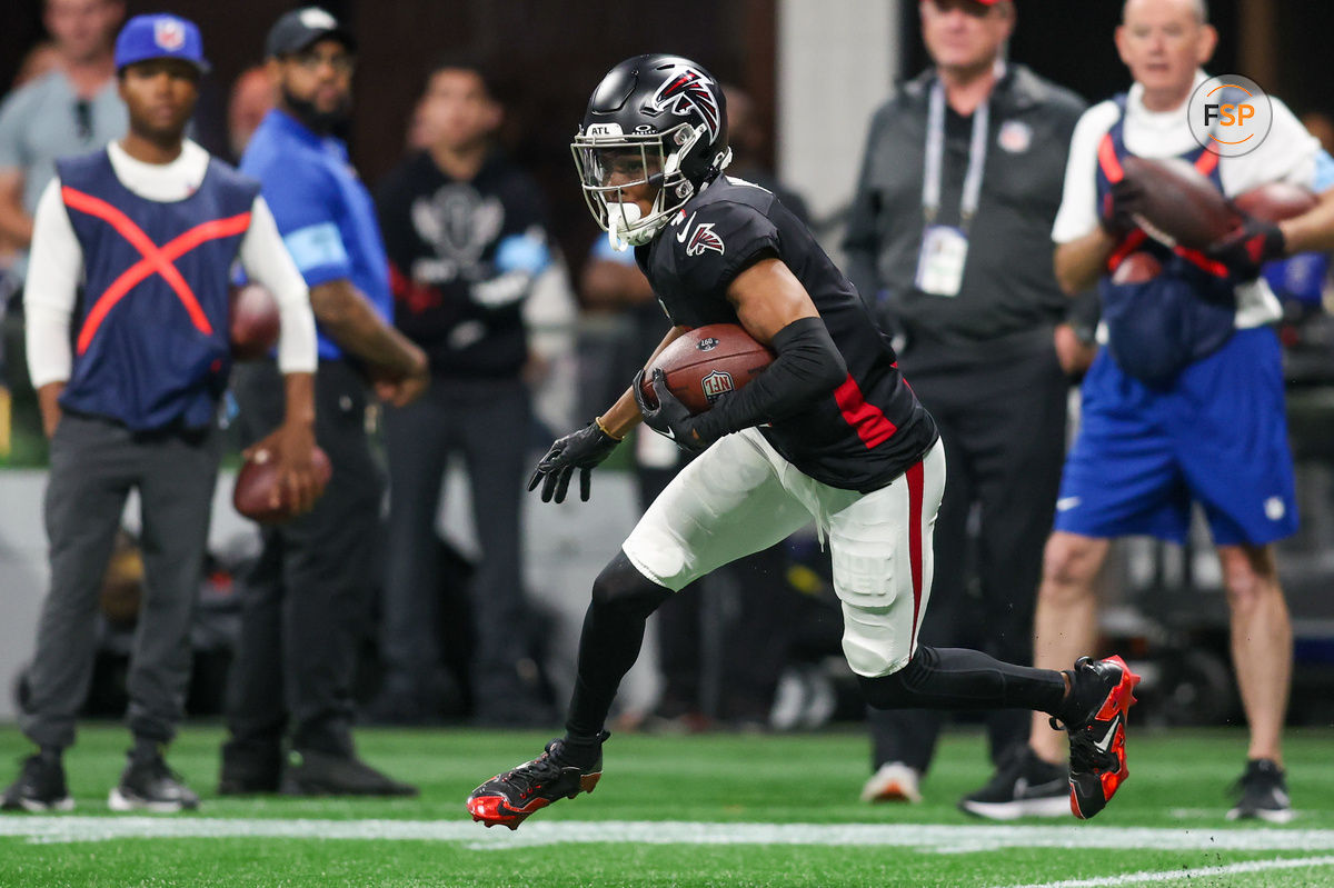 Nov 3, 2024; Atlanta, Georgia, USA; Atlanta Falcons wide receiver Darnell Mooney (1) runs after a catch against the Dallas Cowboys in the third quarter at Mercedes-Benz Stadium. Credit: Brett Davis-Imagn Images
