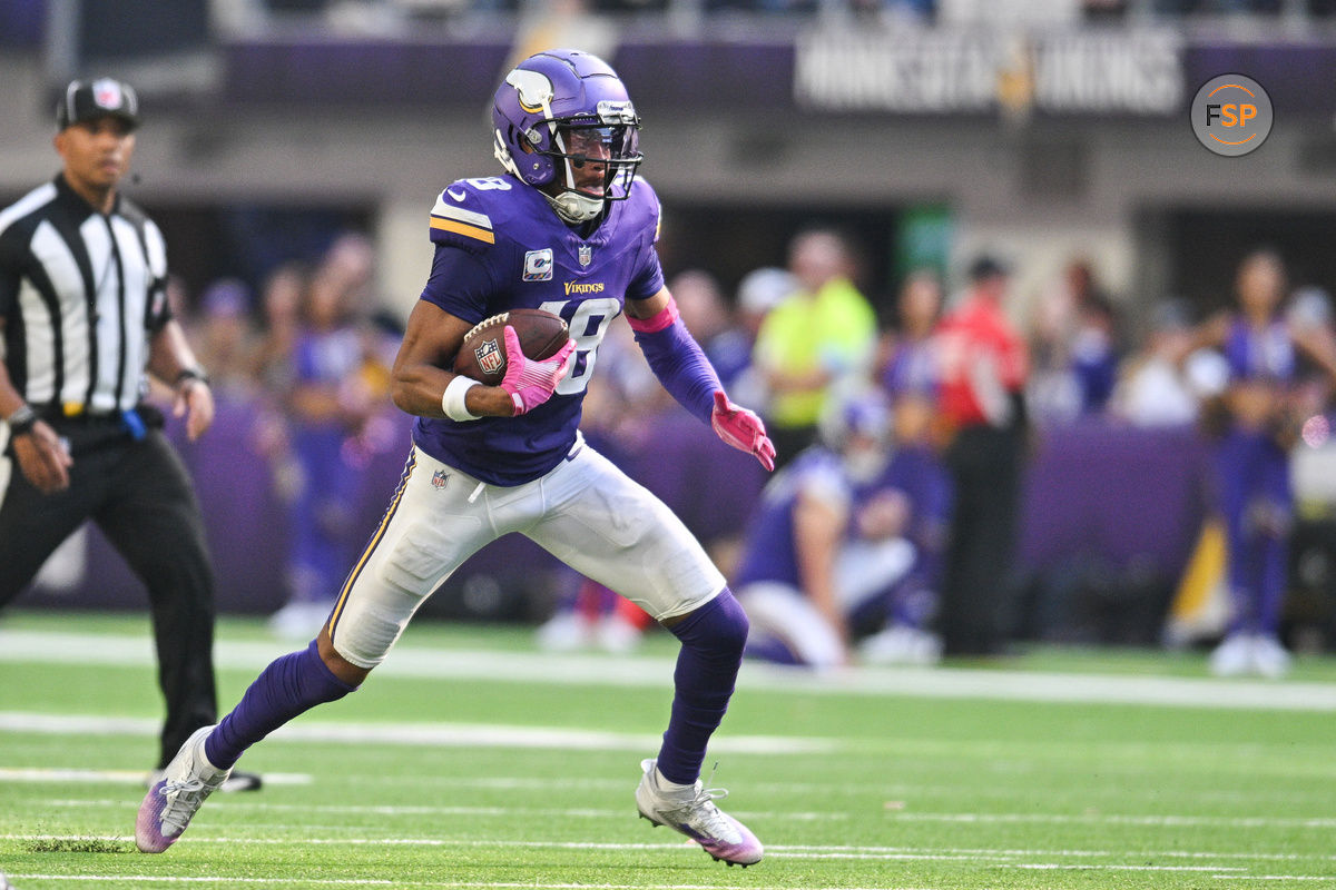 Oct 20, 2024; Minneapolis, Minnesota, USA; Minnesota Vikings wide receiver Justin Jefferson (18) runs the ball against the Detroit Lions during the fourth quarter at U.S. Bank Stadium. Credit: Jeffrey Becker-Imagn Images