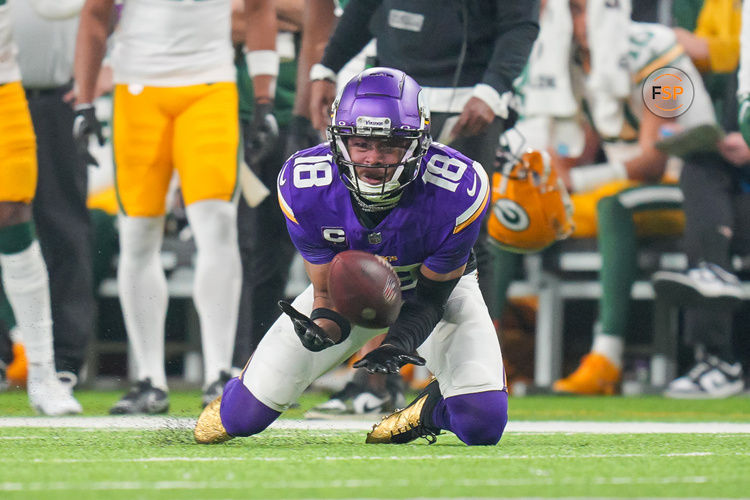 Dec 31, 2023; Minneapolis, Minnesota, USA; Minnesota Vikings wide receiver Justin Jefferson (18) catches a pass against the Green Bay Packers in the second quarter at U.S. Bank Stadium. Credit: Brad Rempel-USA TODAY Sports