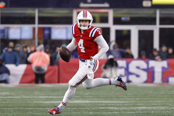 FOXBOROUGH, MA - DECEMBER 03: New England Patriots quarterback Bailey Zappe (4) takes off on a keeper during a game between the New England Patriots and the Los Angeles Chargers on December 3, 2023, at Gillette Stadium in Foxborough, Massachusetts. (Photo by Fred Kfoury III/Icon Sportswire)