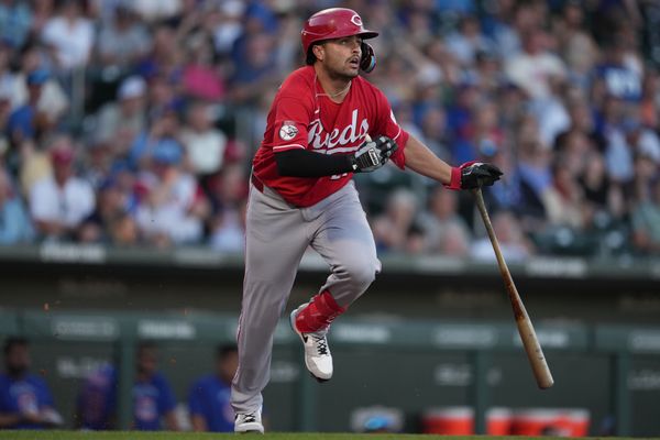Mar 20, 2026; Mesa, Arizona, USA; Cincinnati Reds third baseman Sal Stewart (27) hits a double against the Chicago Cubs in the second inning at Sloan Park. Mandatory Credit: Rick Scuteri-Imagn Images