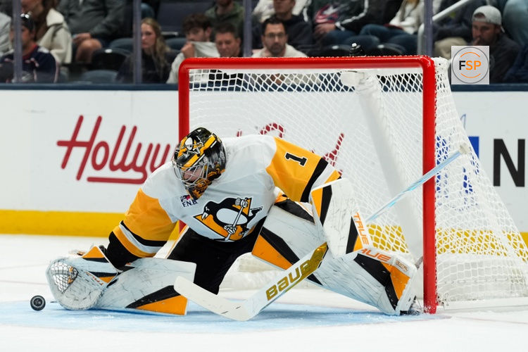 Sep 24, 2026; Columbus, Ohio, USA;  Pittsburgh Penguins goaltender Sergei Murashov (1) makes a save in net against the Columbus Blue Jackets in the first period at Nationwide Arena. Credit: Aaron Doster-Imagn Images
