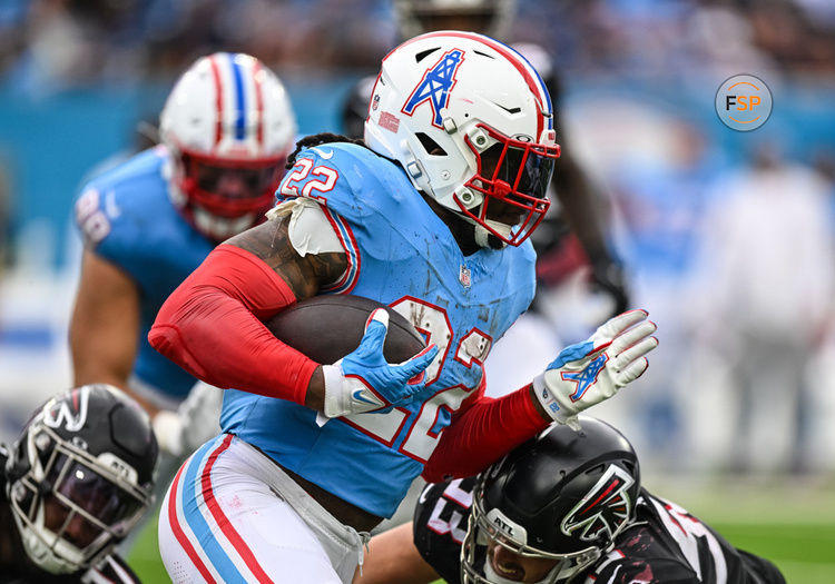 NASHVILLE, TN - OCTOBER 29: Tennessee Titans running back Derrick Henry (22) runs with the ball during a game between the Tennessee Titans and the Atlanta Falcons on October 29, 2023, at Nissan Stadium in Nashville, TN.  (Photo by Bryan Lynn/Icon Sportswire)